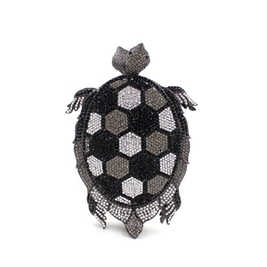 Exquisite turtle clutch bag featuring hand-set crystals and a geometric hexagon pattern