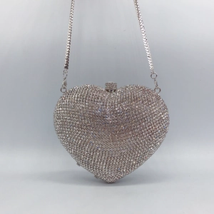 Elegant heart-shaped evening clutch bag with sparkling crystal rhinestones and silver chain