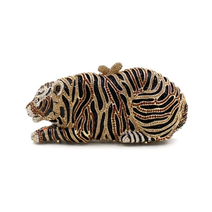Detailed view of the tiger-shaped evening clutch with sparkling crystal rhinestones