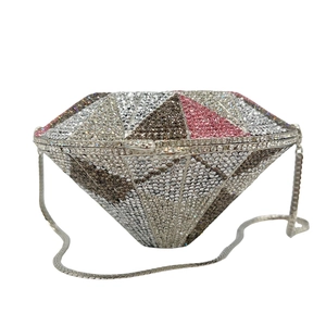 Detailed view of luxury geometric crystal evening clutch with sparkling rhinestones
