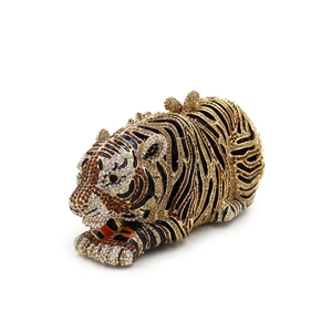 Detail of tiger-shaped clutch with intricate multicolor rhinestones and gold hardware