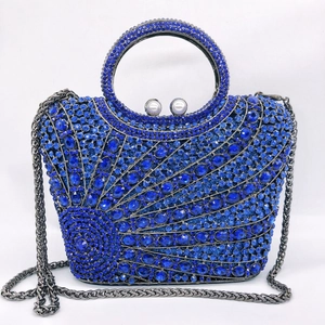 Elegant blue crystal evening clutch bag with scalloped pattern and metal ring handle