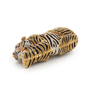 Detailed close-up of tiger-shaped evening clutch bag with sparkling crystal rhinestones