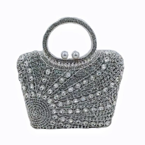 Silver crystal rhinestone clutch evening bag with metal handle and pearl clasp detail