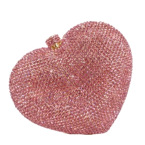Sparkling pink heart crystal clutch bag with a metallic top clasp for formal parties