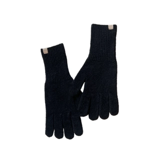 Classic black knitted winter gloves with ribbed cuffs and branded patch for cold weather