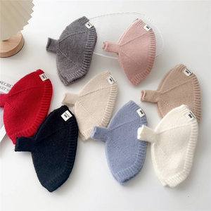 Gants en tricot sans doigts en plusieurs couleurs avec étiquette logo et texture douce