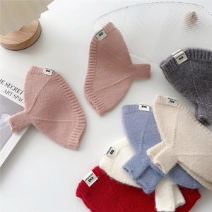 Gants tricotés sans doigts épais aux couleurs pastel avec motif à côtes élégant