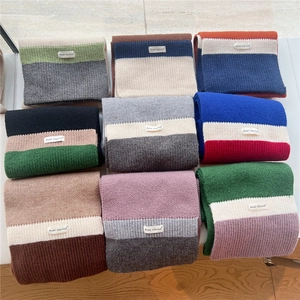 Tricolor chunky knit scarf in nine colorways featuring warm soft winter yarn material