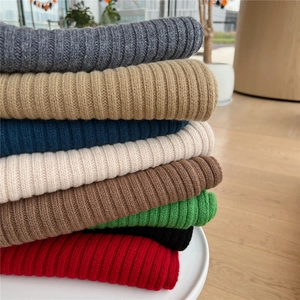 Vertical ribbed knit wool scarf collection in multiple solid colors for winter warmth