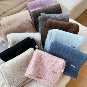 Thick colorful winter knit scarves with soft mohair texture and metal logo detail