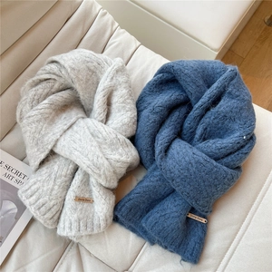 Chunky knit winter scarf in light grey and blue colors with premium leather brand tag