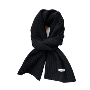 Solid black 100% wool ribbed knit scarf for women with soft texture and warm finish