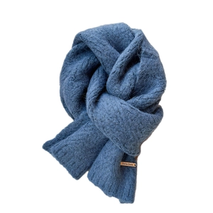 Thick knitted candy color winter scarf in dusty blue with a premium leather brand tag