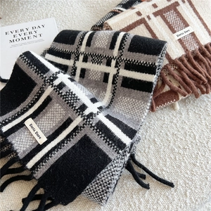 Winter striped knit scarves with tassels in black-grey and beige coffee color tones