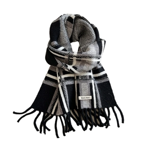 Winter chunky knit striped scarf with fringes in black, white, and grey classic plaid pattern