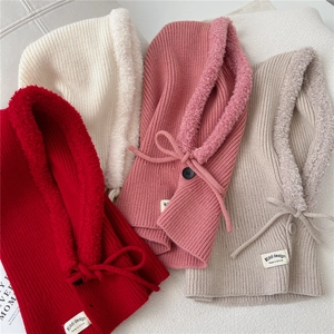Close-up of ribbed knit balaclava with thick faux shearling lining and adjustable drawstrings