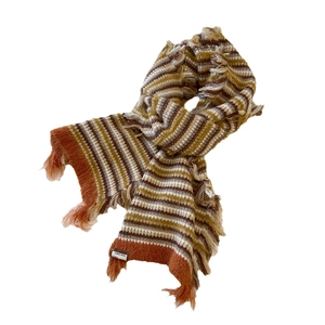 Winter striped knit scarf in brown and orange tones with fringe edges and wool label