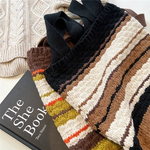 Striped knit tote bag with thick texture in brown and beige tones for daily use