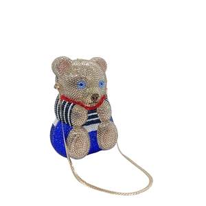 Sac de soirée en forme d'ours avec strass, nœud rouge et bandoulière chaîne dorée