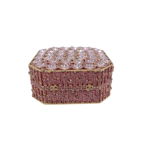 Detailed macro view of the hexagonal pink rhinestone evening clutch with large crystals