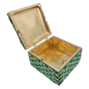 Green crystal clutch bag with square weave texture and gold metal lining in open view