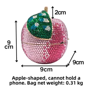 Apple crystal clutch detail showing 9cm diameter size and luxury rhinestone texture