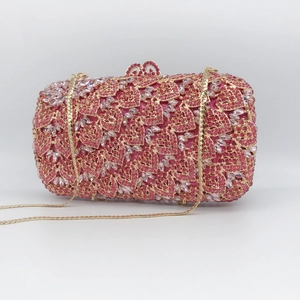 Elegant rose pink hollow out metal clutch with rhinestones and crystal leaf patterns