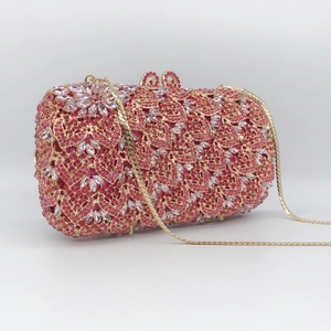 Pink rhinestone encrusted clutch evening bag with elegant gold metal chain strap