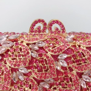 Pink rhinestone clutch bag with gold leaf pattern for elegant evening party wear