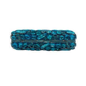 Detailed close-up of sky blue crystal rhinestone evening clutch bag with silver frame