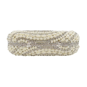 Detail of the pearlescent beads and shimmering crystals on this elegant evening clutch bag