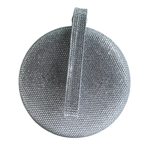 Close-up of a round evening bag featuring densely set silver rhinestones and a jeweled handle