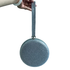 Elegant silver round evening bag with full diamond rhinestones and wristlet strap