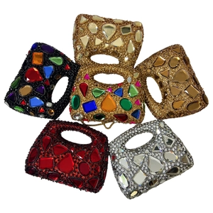 Luxurious faceted rhinestone evening clutch bags in multiple colors with oval ring handles