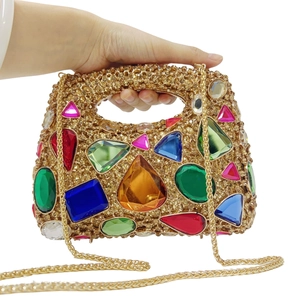 Sparkling stone evening handbag with colorful rhinestones and gold top handle