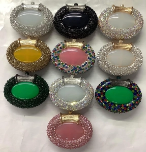 Macro view of assorted oval rhinestone clutch bags with crystal embellishments