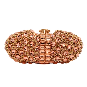 Luxurious rose gold clutch bag encrusted with pink and champagne sparkling rhinestones