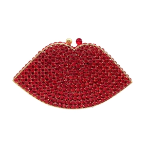 Sparkling red lip-shaped evening clutch bag encrusted with rhinestones and gold metal trim