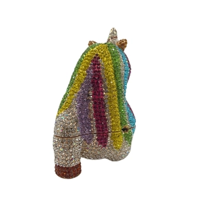 Detailed view of rainbow rhinestone unicorn clutch bag with sparkling colorful crystals