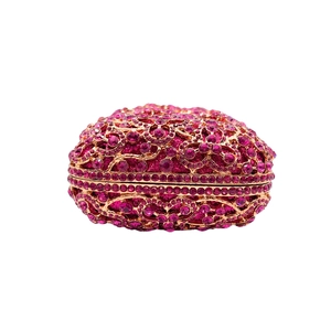 Luxuriöse ovale Abendtasche mit goldenen Blumenmustern und rosa Strasssteinen