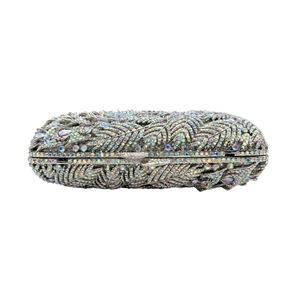 Macro detail of luxury evening clutch with sparkling AB crystals in leaf pattern