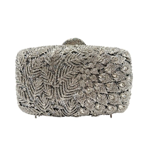 Elegant silver crystal clutch with palm leaf pattern for evening parties and weddings