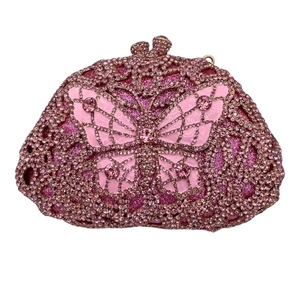 Detailed view of handmade pink crystal butterfly clutch with sparkling rhinestone finish