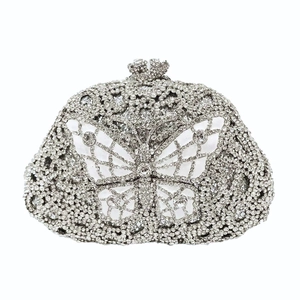 Close-up of luxury silver butterfly evening clutch with sparkling crystal rhinestones