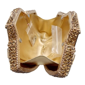 Luxurious gold hollow out clutch bag with crystal rhinestones and detachable chain strap