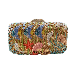Luxury rhinestone evening clutch featuring a colorful underwater world with fish and starfish