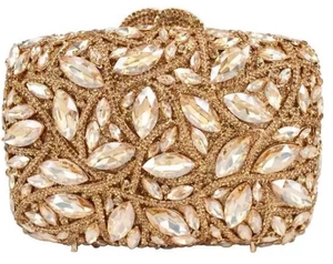 Detailed front view of luxury gold evening clutch with leaf crystal and rhinestone patterns