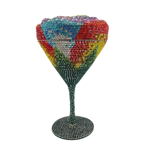 Detail of martini cup clutch bag featuring handmade rainbow gradient crystal rhinestones