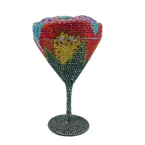 Detailed macro view of cocktail cup evening bag with colorful floral rhinestones
